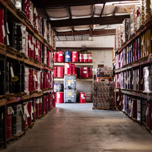 GEAROIL Warehouse inventory of industrial gear oil, extreme pressure lubricant products, and axle fluid ready for delivery to commercial and industrial customers.